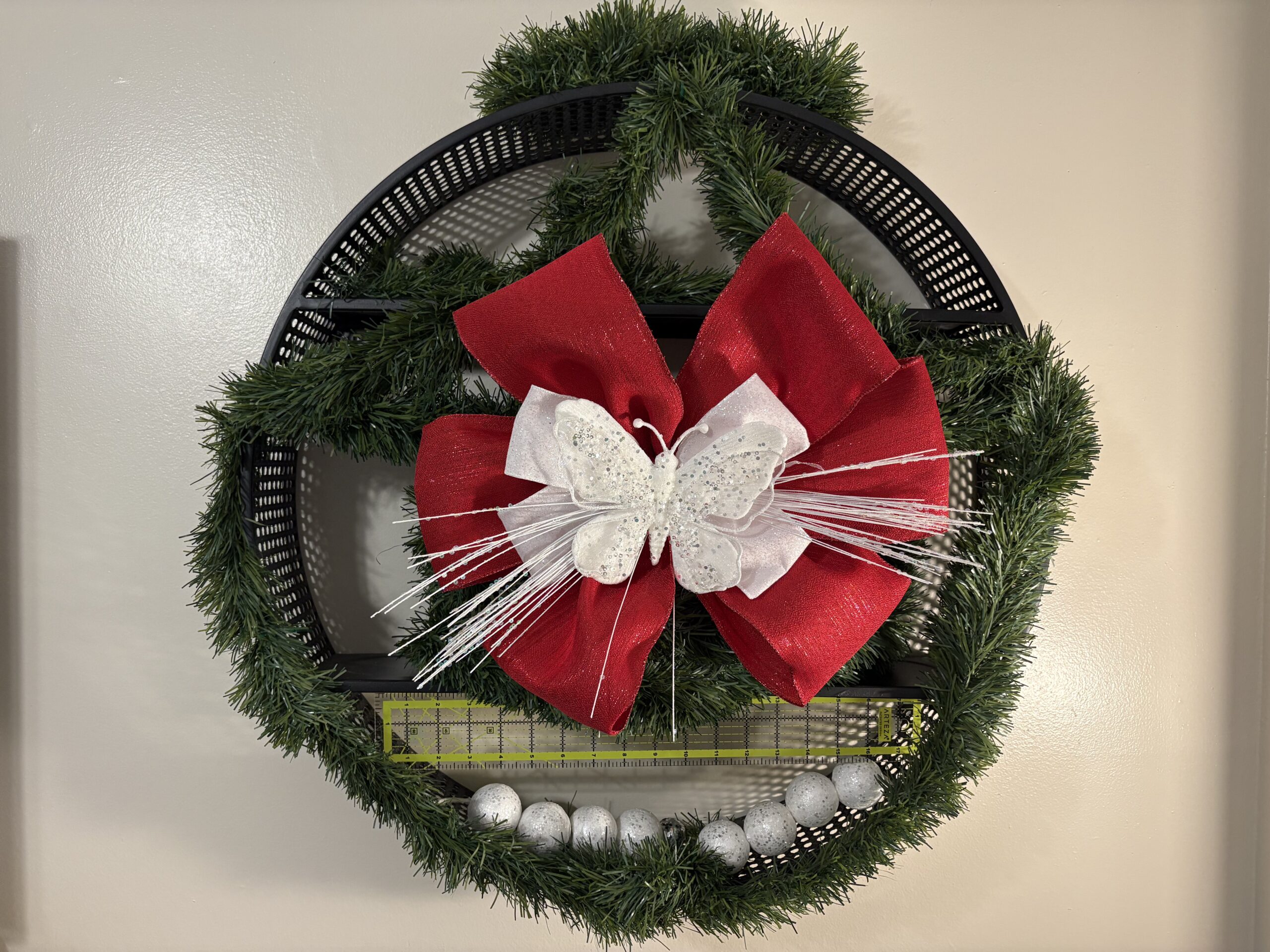 Stunning red and white Christmas bow made from red and white Christmas ribbons. Unique Red and white holiday decor.